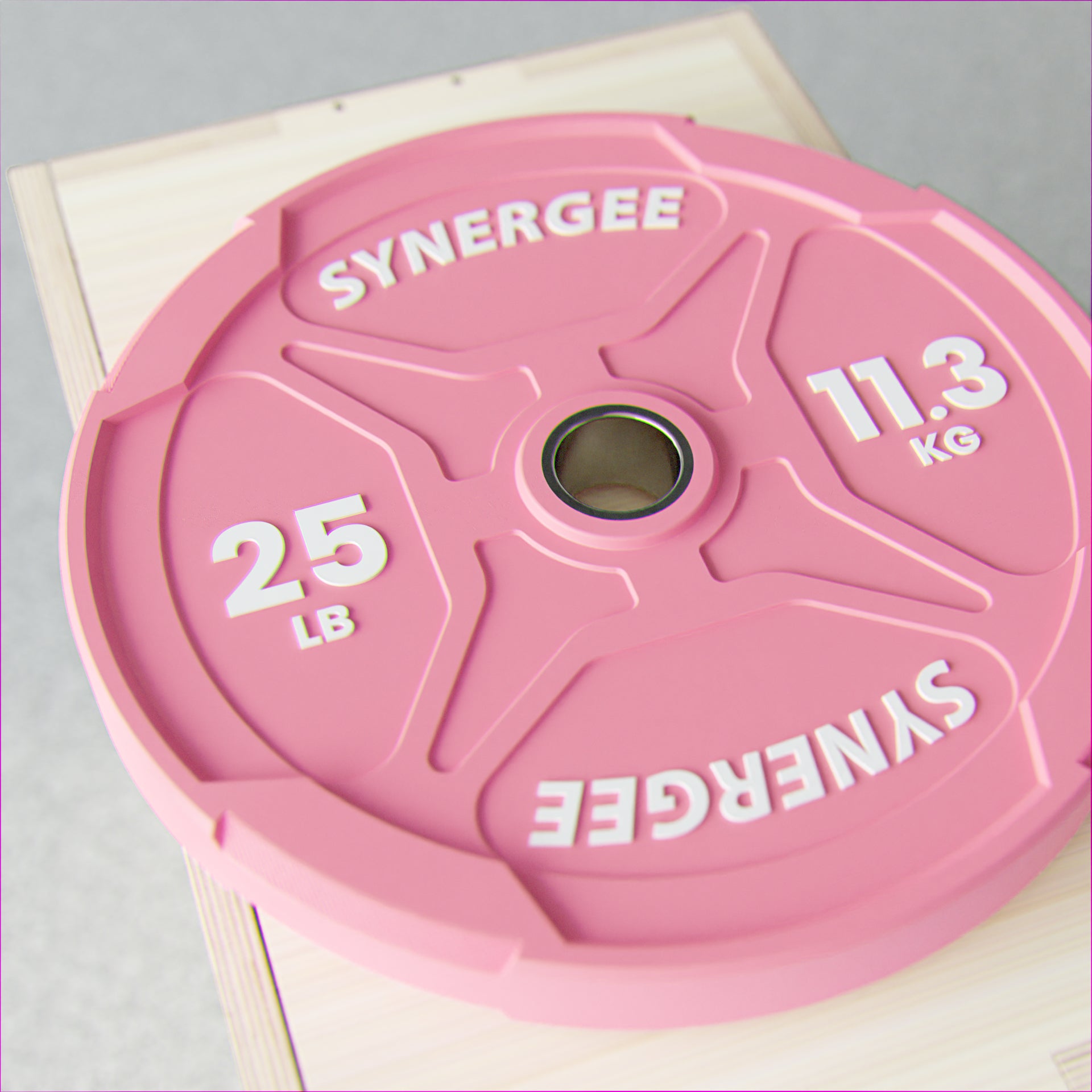 Synergee Pink EZ Grip Bumper Plates | Synergee Fitness Canada